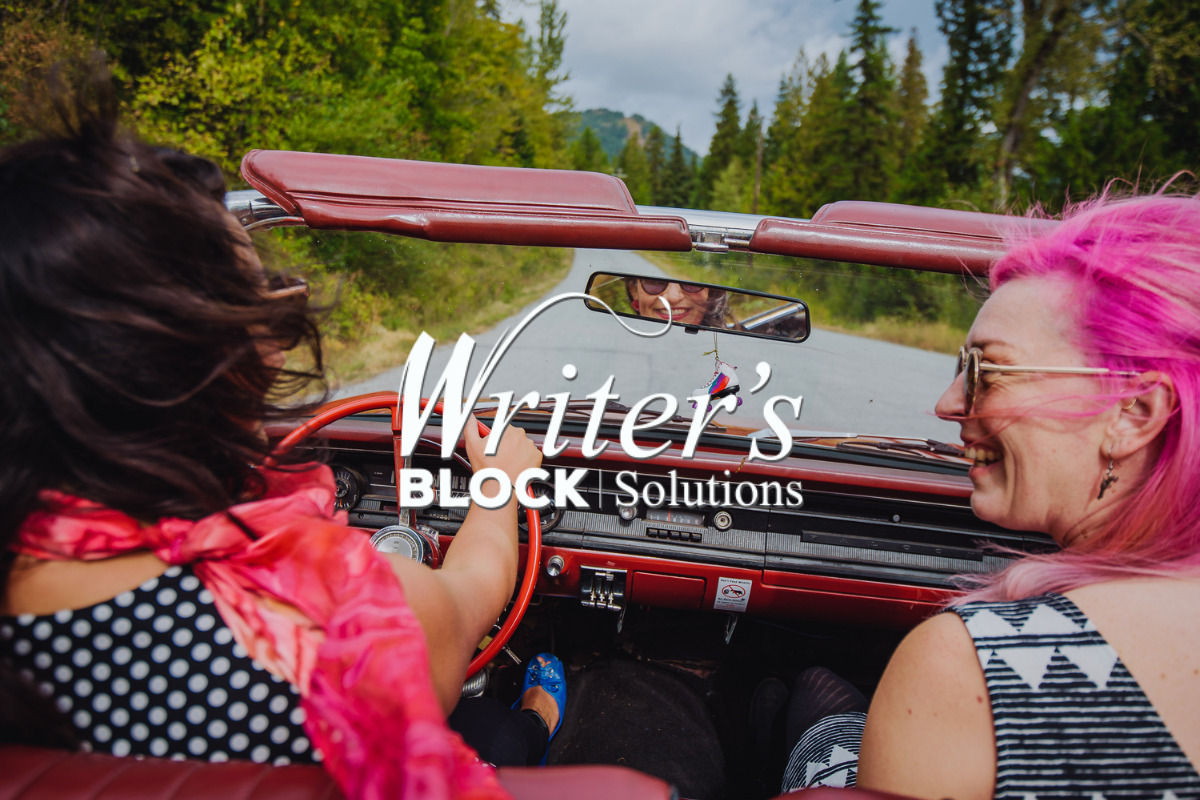 the Writer's Block Solutions logo overlayed on an image of two women in a red convertible driving down a forest road