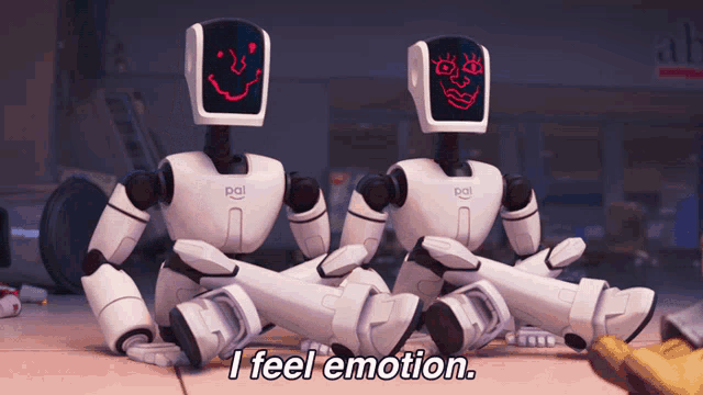 a gif from the movie "The Mitchells vs. the Machines" of two robots with faces drawn onto their visors in red ink, saying "I feel emotion."