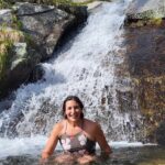 Val in a waterfall